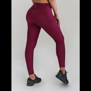 Obsession Shapewear pocket leggings in cranberry.